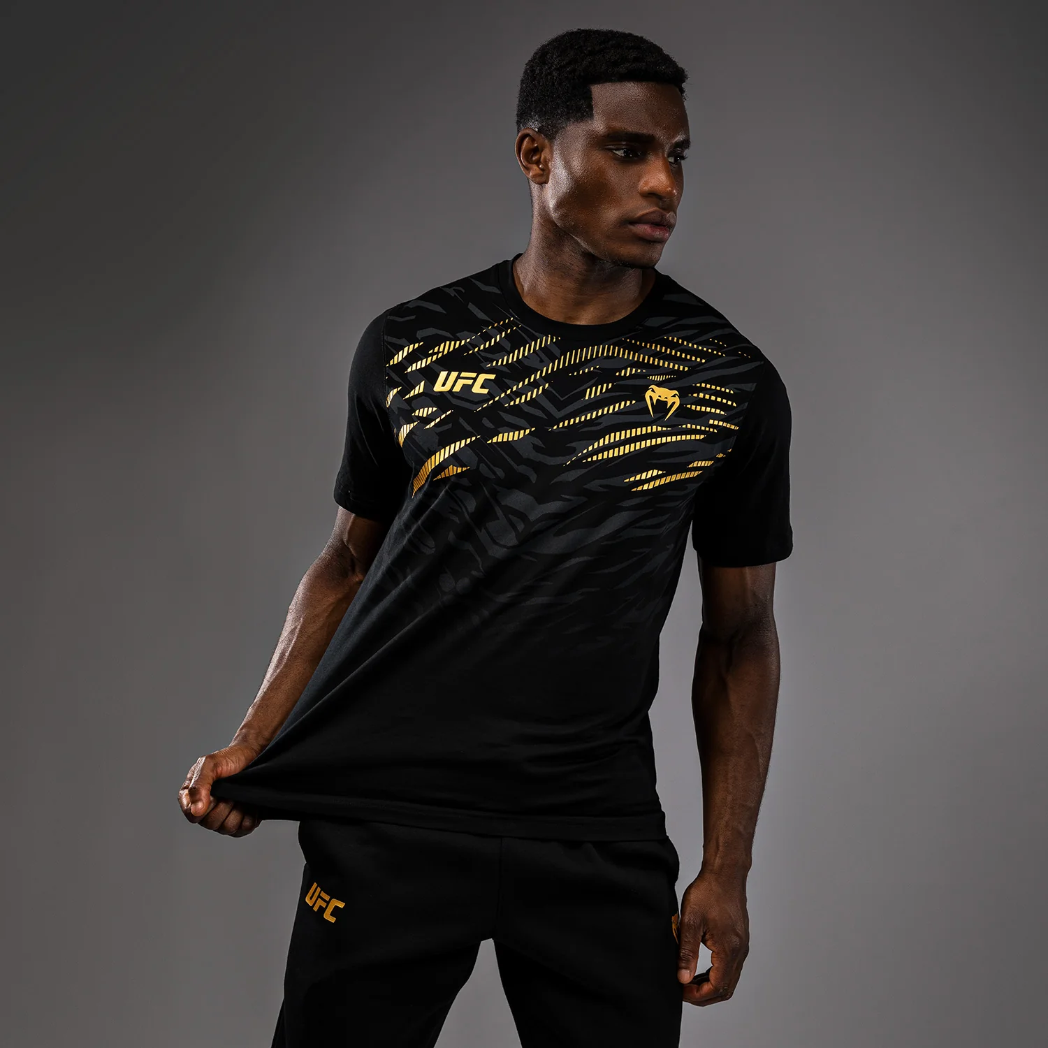 UFC Fusion by Venum Men’s Replica Short Sleeve T-Shirt - Champion - Image 4