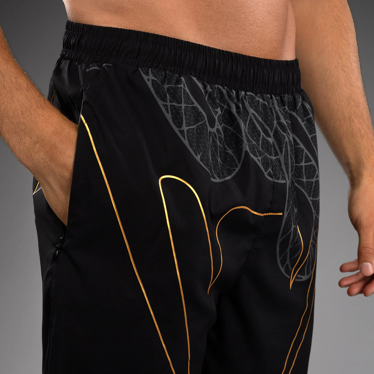 Venum Serpenti Training Shorts - Black/Silver/Gold - Image 7
